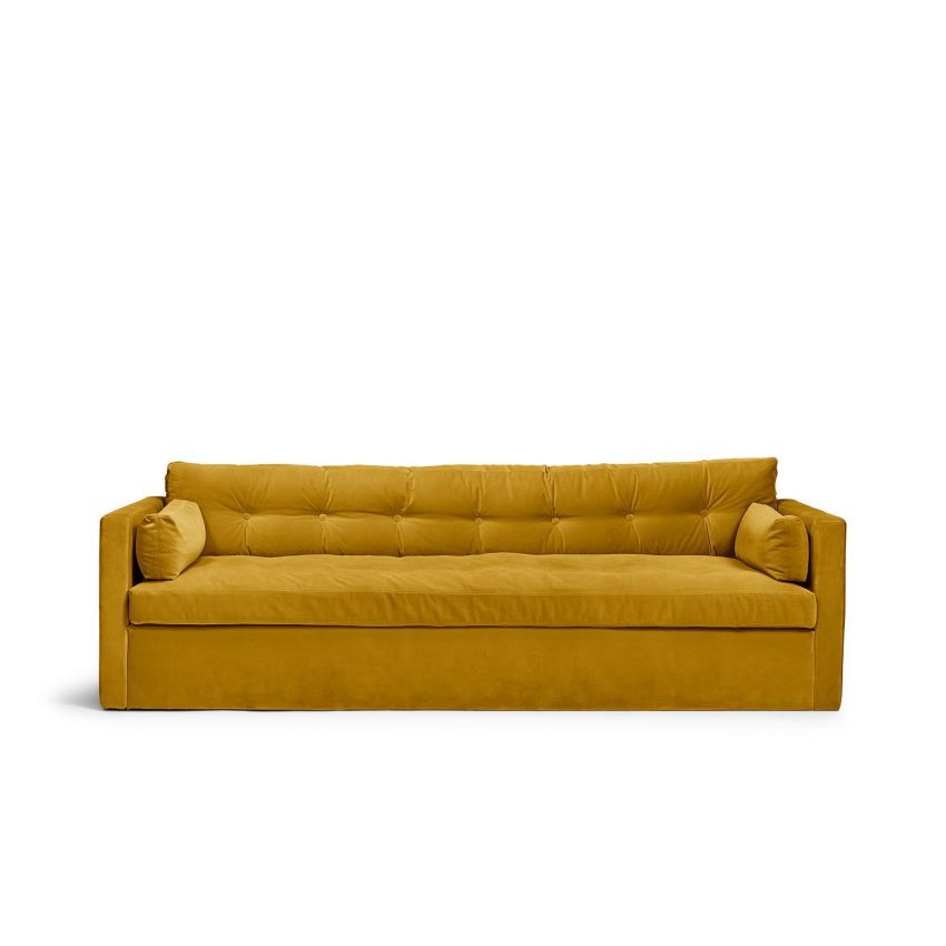 Dahlia Original 3-Sitssoffa Amber är en djup och bekväm soffa i mörkgul sammet från Melimeli