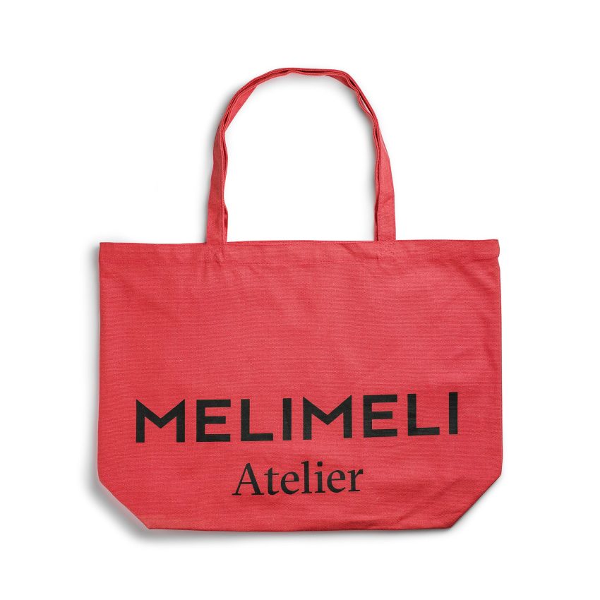 Röd tygväska med logga från Melimeli